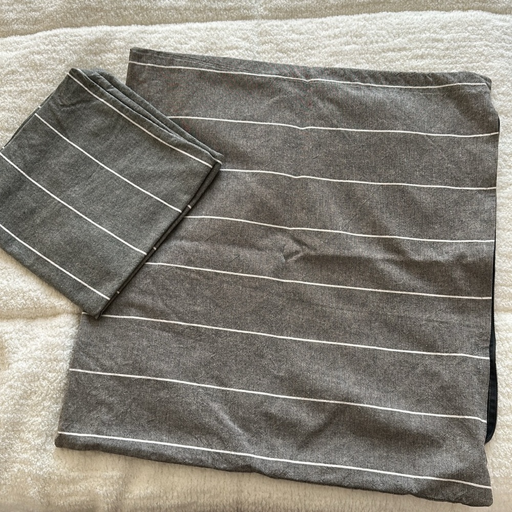 Two IKEA Mildrun pillow covers